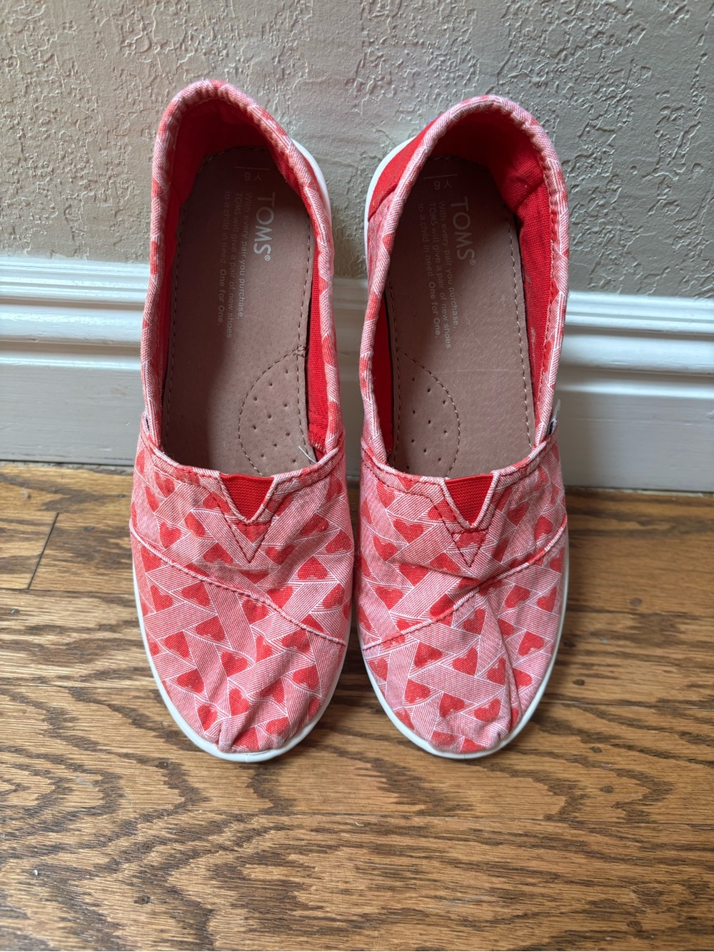 TOMS Pink Slip-On Shoes with Red Heart Pattern